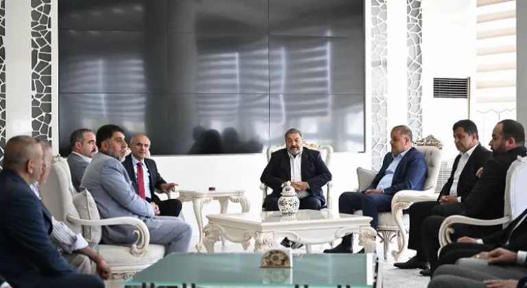 MHP Heyetinden Başkan Er'e Destek Ziyareti